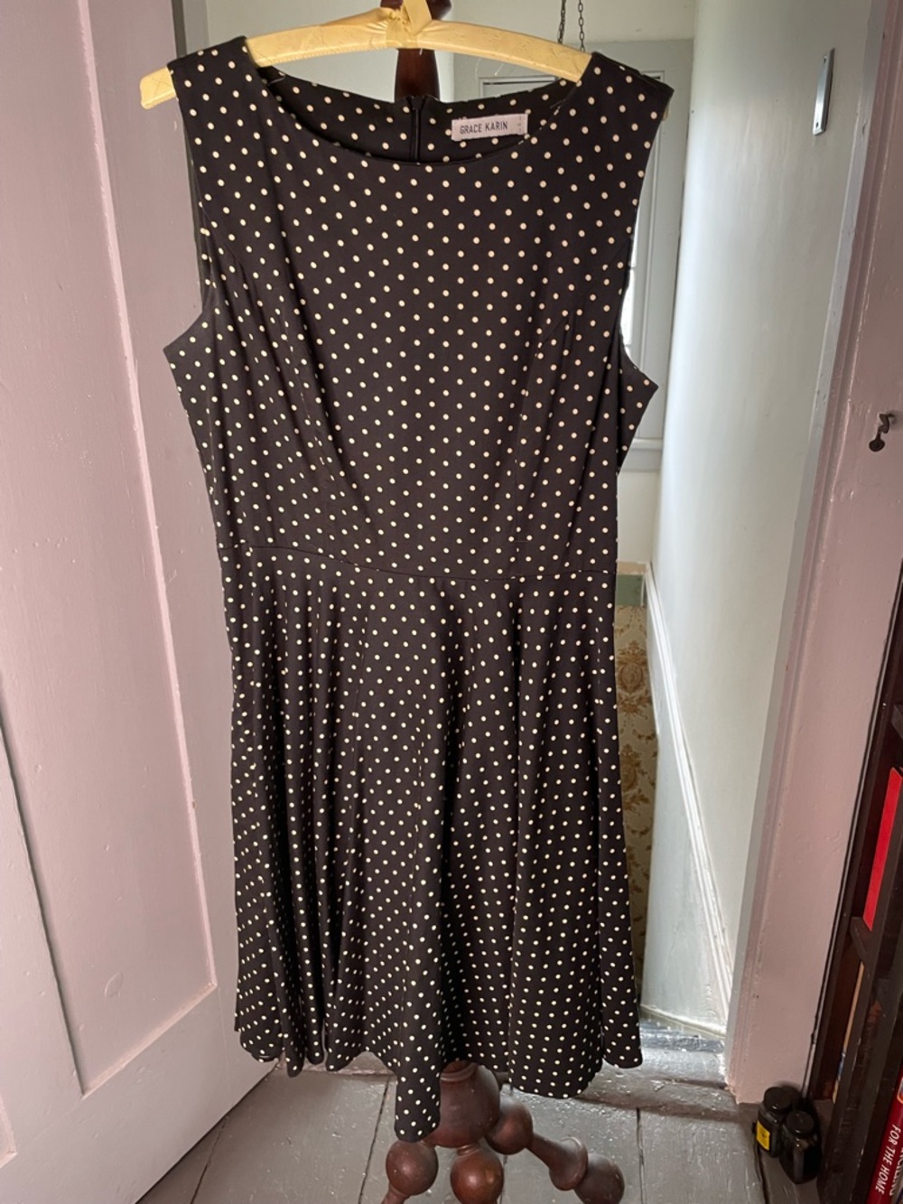 Black and white polka dot swing dress